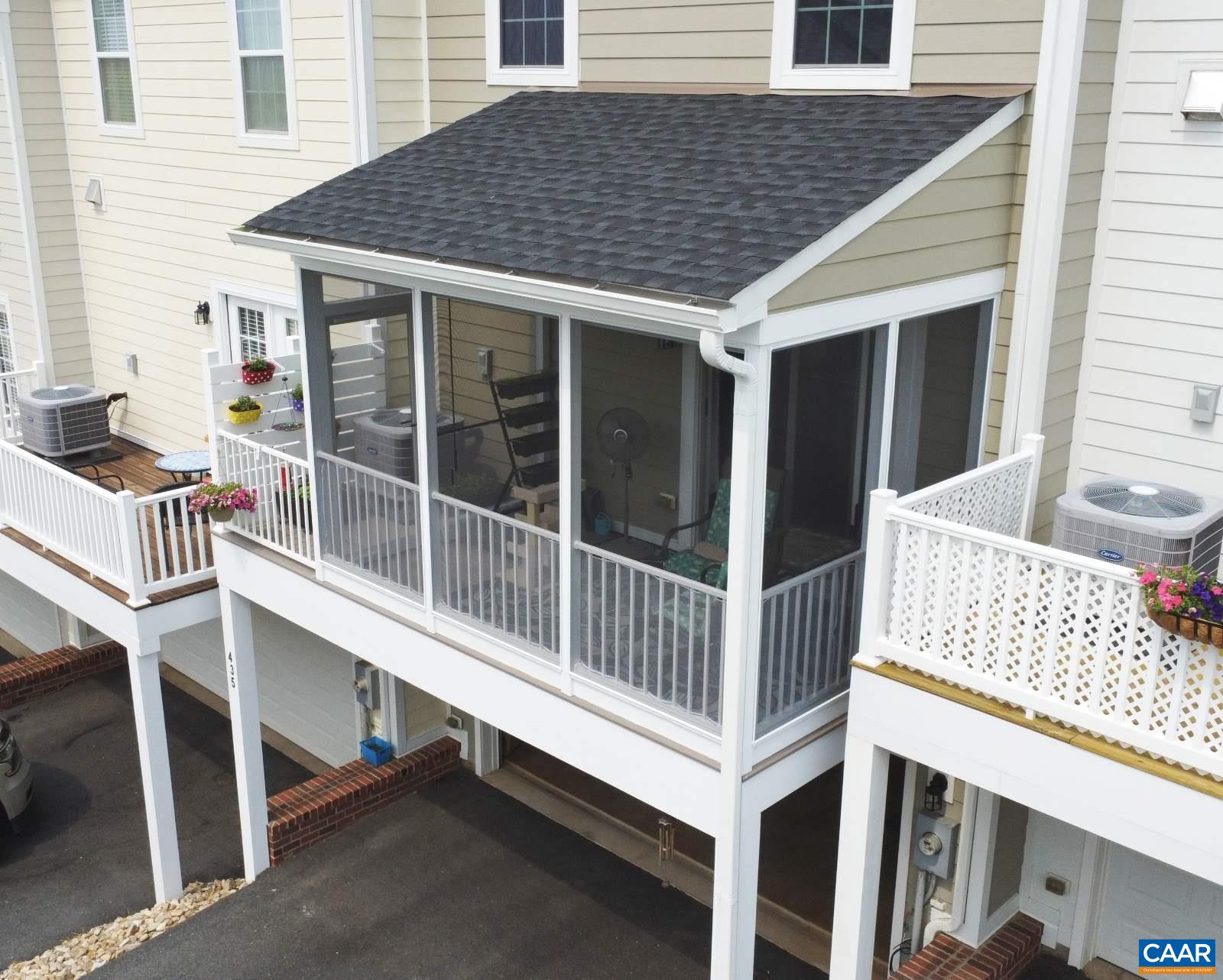 435 Rolkin Road Charlottesville, VA 22911 - Photo 4 of 56 a roof deck with a table and a barbeque