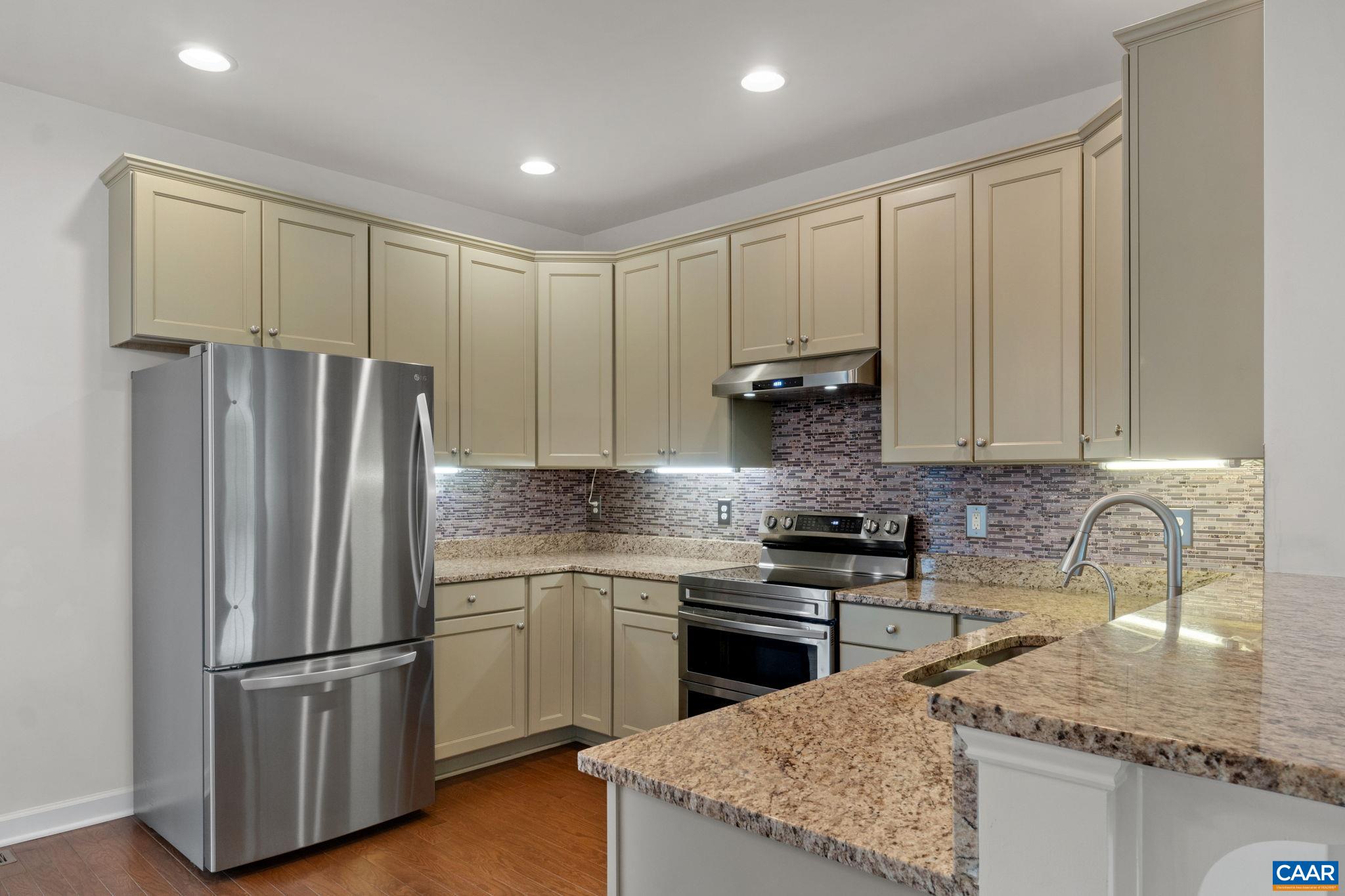 435 Rolkin Road Charlottesville, VA 22911 - Photo 8 of 56 a kitchen with stainless steel appliances granite countertop a refrigerator stove and sink