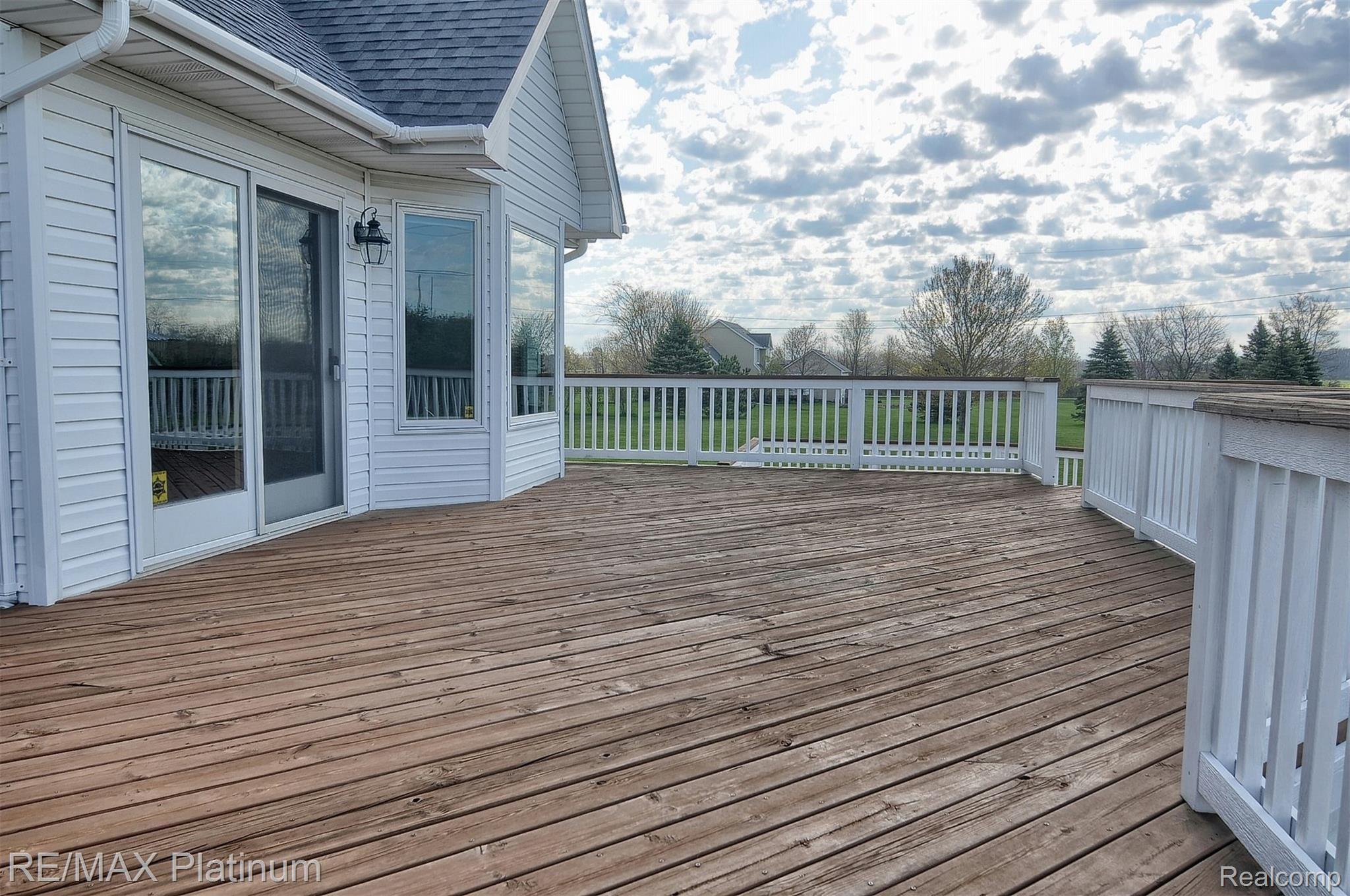 7766 Clyde Road Fenton, MI 48430 - Photo 29 of 31 29-Deck 2nd View.jpg