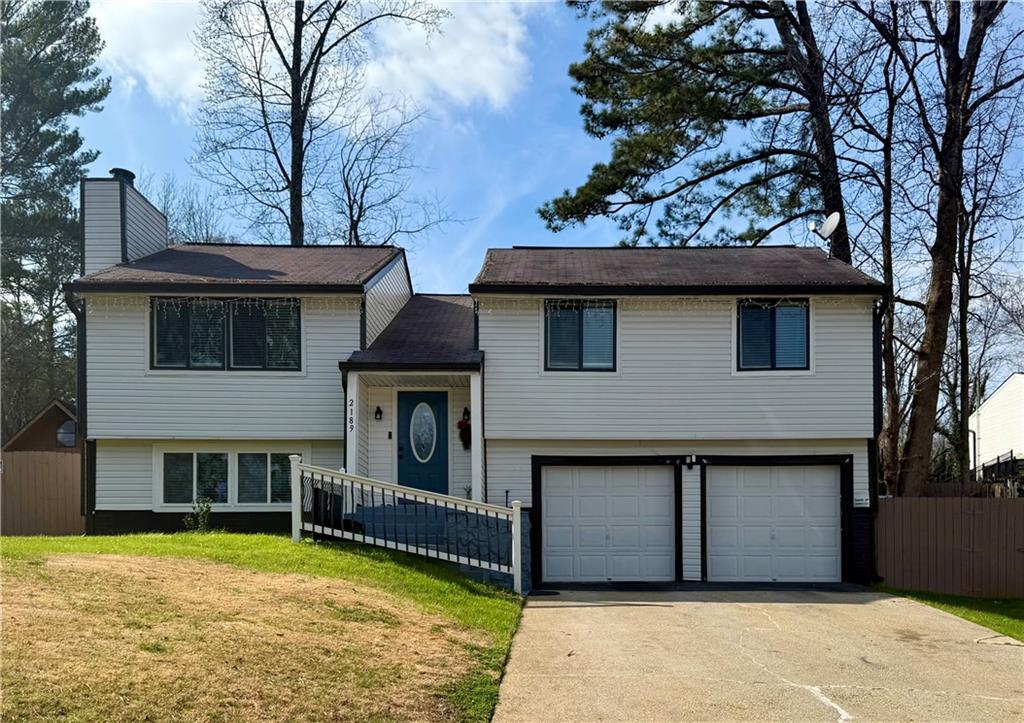 2189 Wesley Court Norcross, GA 30071 - Photo 1 of 1 a house with swimming pool in front of it
