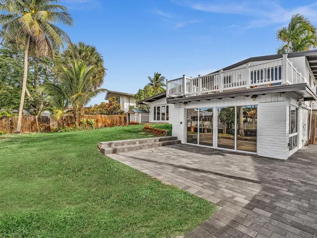 a bathroom with a sink a toilet and bathtub