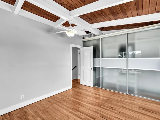 a kitchen with stainless steel appliances granite countertop a refrigerator stove and sink