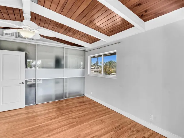 a black and white photo of a bench