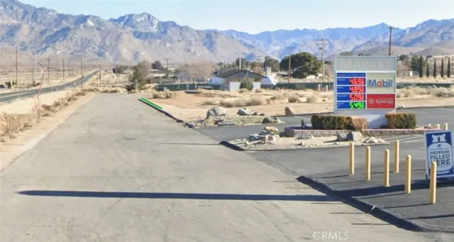 a view of kitchen and a mountain
