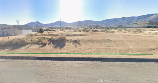 a view of a house with a mountain