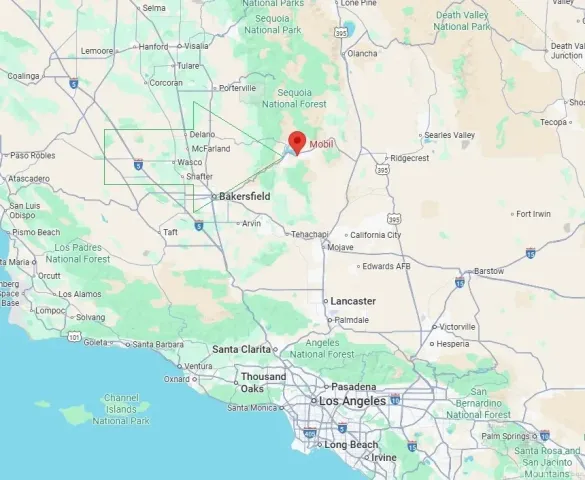 a white and white tub sitting in a bathroom