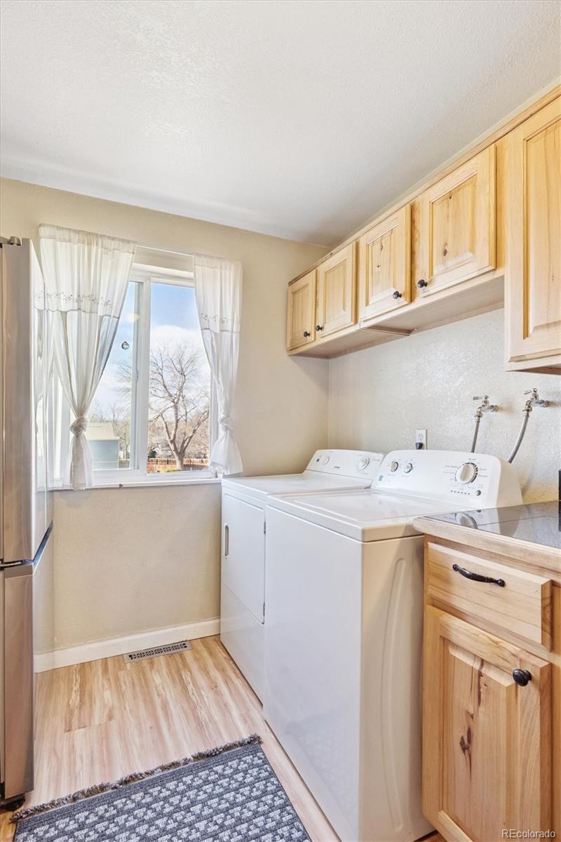 7984 Chase Circle, Unit 68 Arvada, CO 80003 - Photo 12 of 27 a view of utility room with washer and dryer
