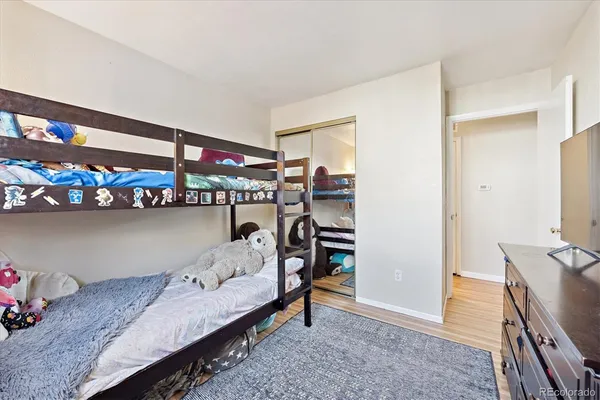 a bedroom with furniture and a bed