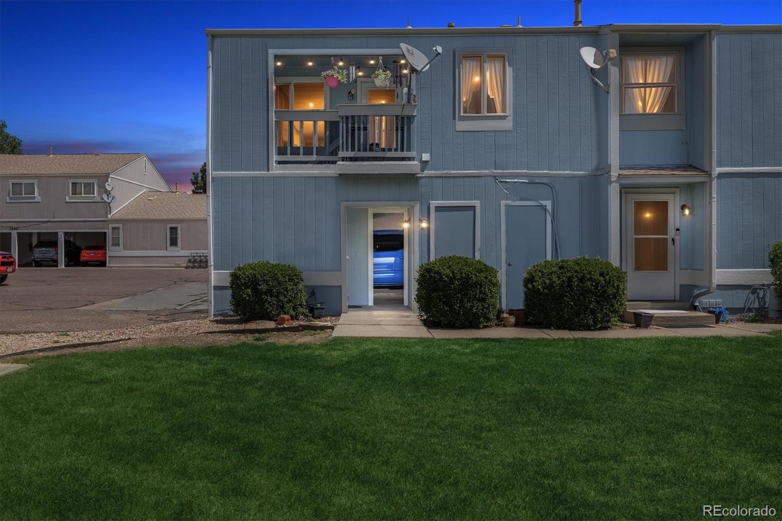 7984 Chase Circle, Unit 68 Arvada, CO 80003 - Photo 26 of 27 a house view with a sitting space and garden