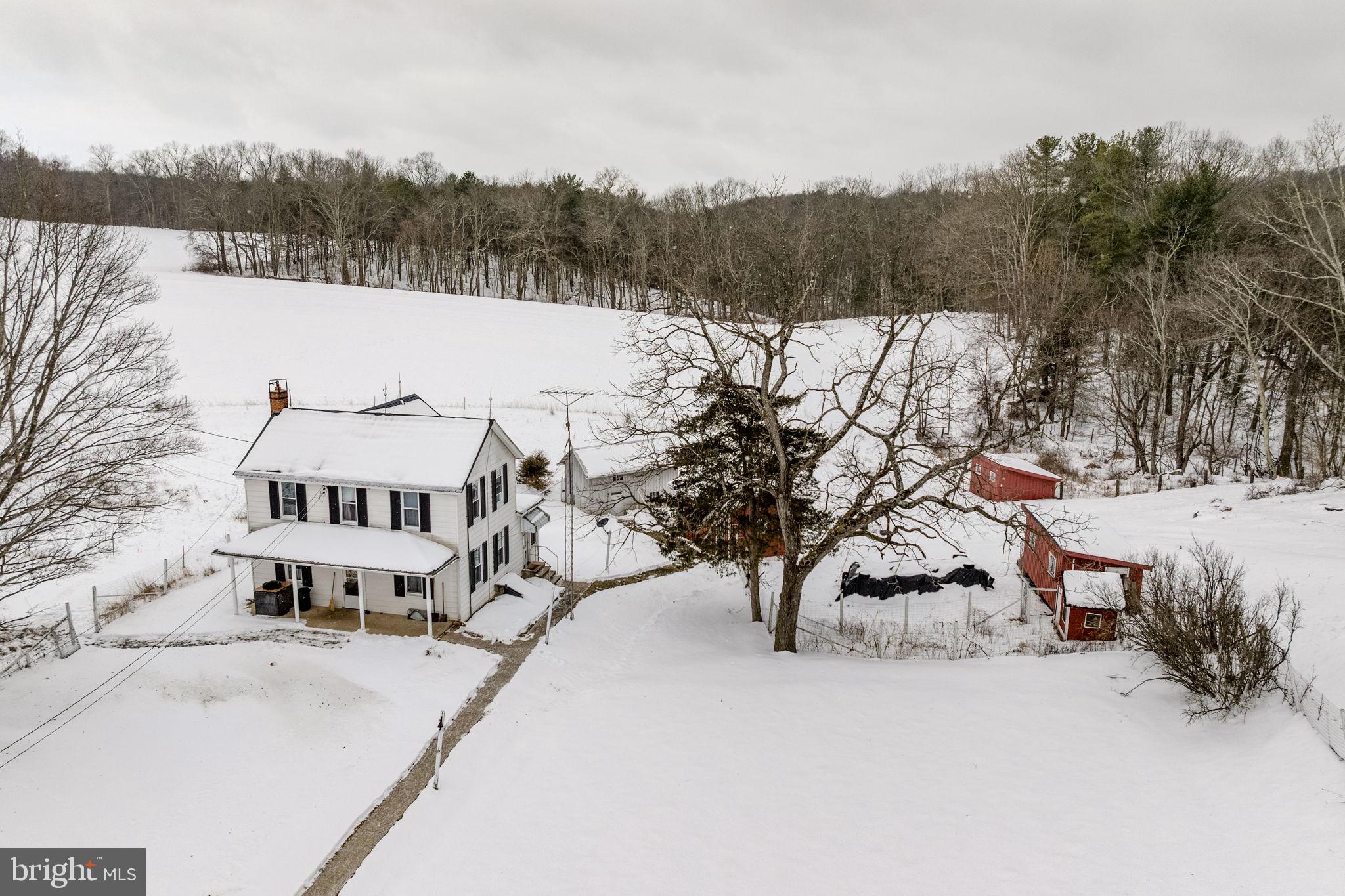 22314 Miller Road Shade Gap, PA 17255 - Photo 11 of 73 a view of a house with a yard and covered with snow