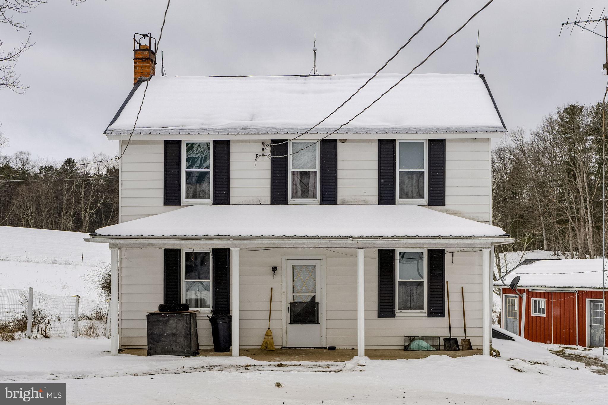 22314 Miller Road Shade Gap, PA 17255 - Photo 16 of 73 a front view of a house with a yard