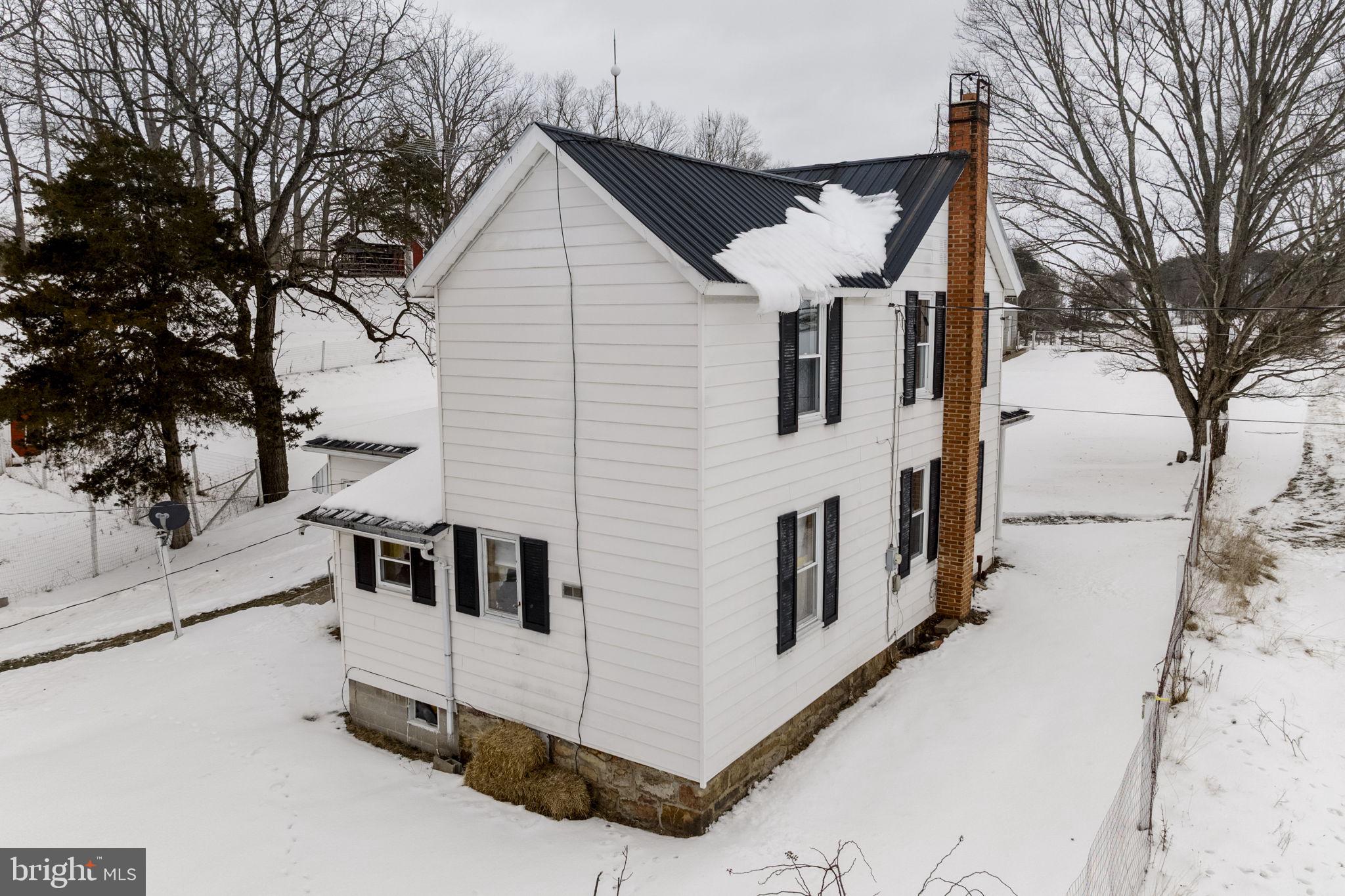 22314 Miller Road Shade Gap, PA 17255 - Photo 18 of 73 a view of a white house with a large windows