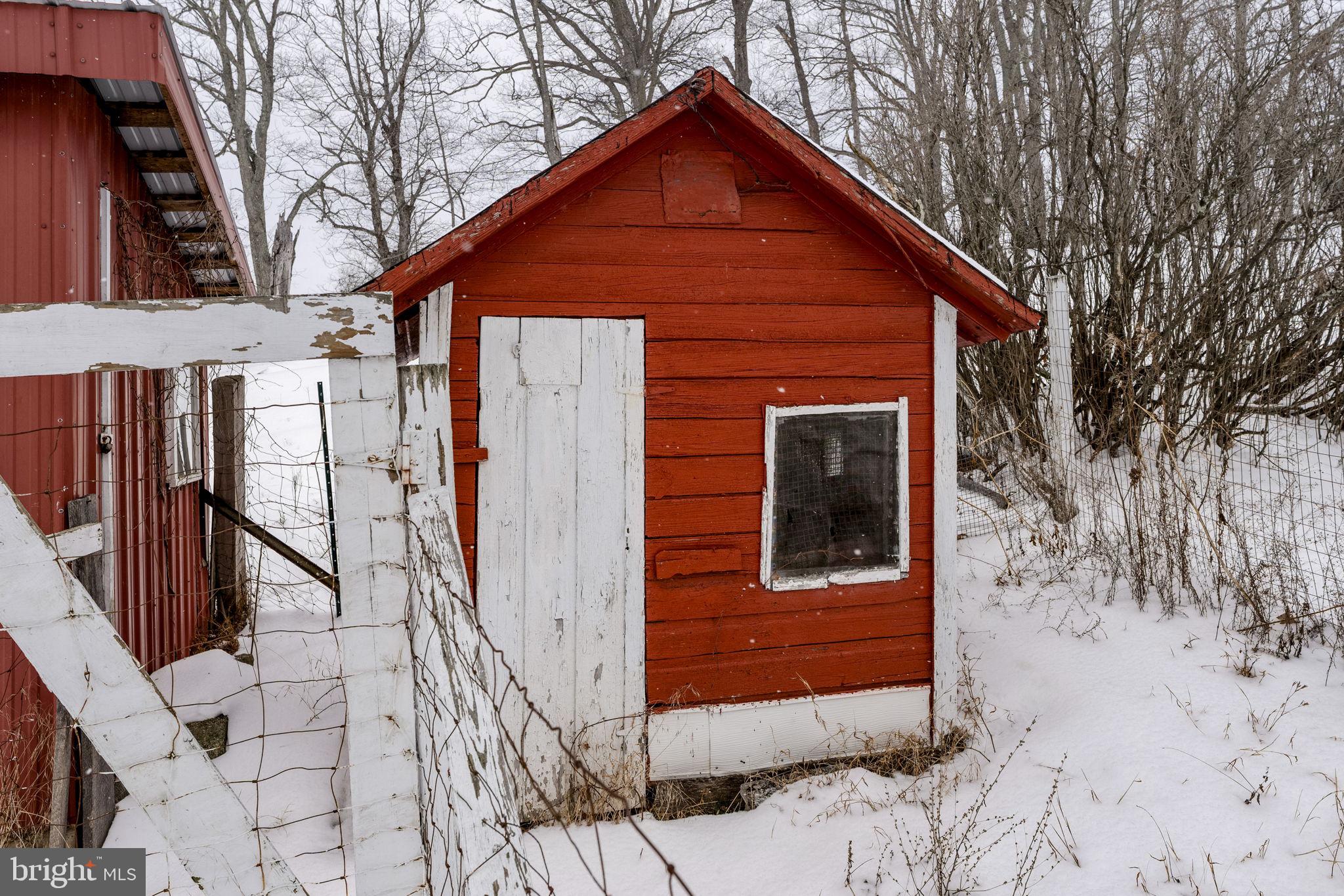 22314 Miller Road Shade Gap, PA 17255 - Photo 32 of 73 a front view of a house with garage