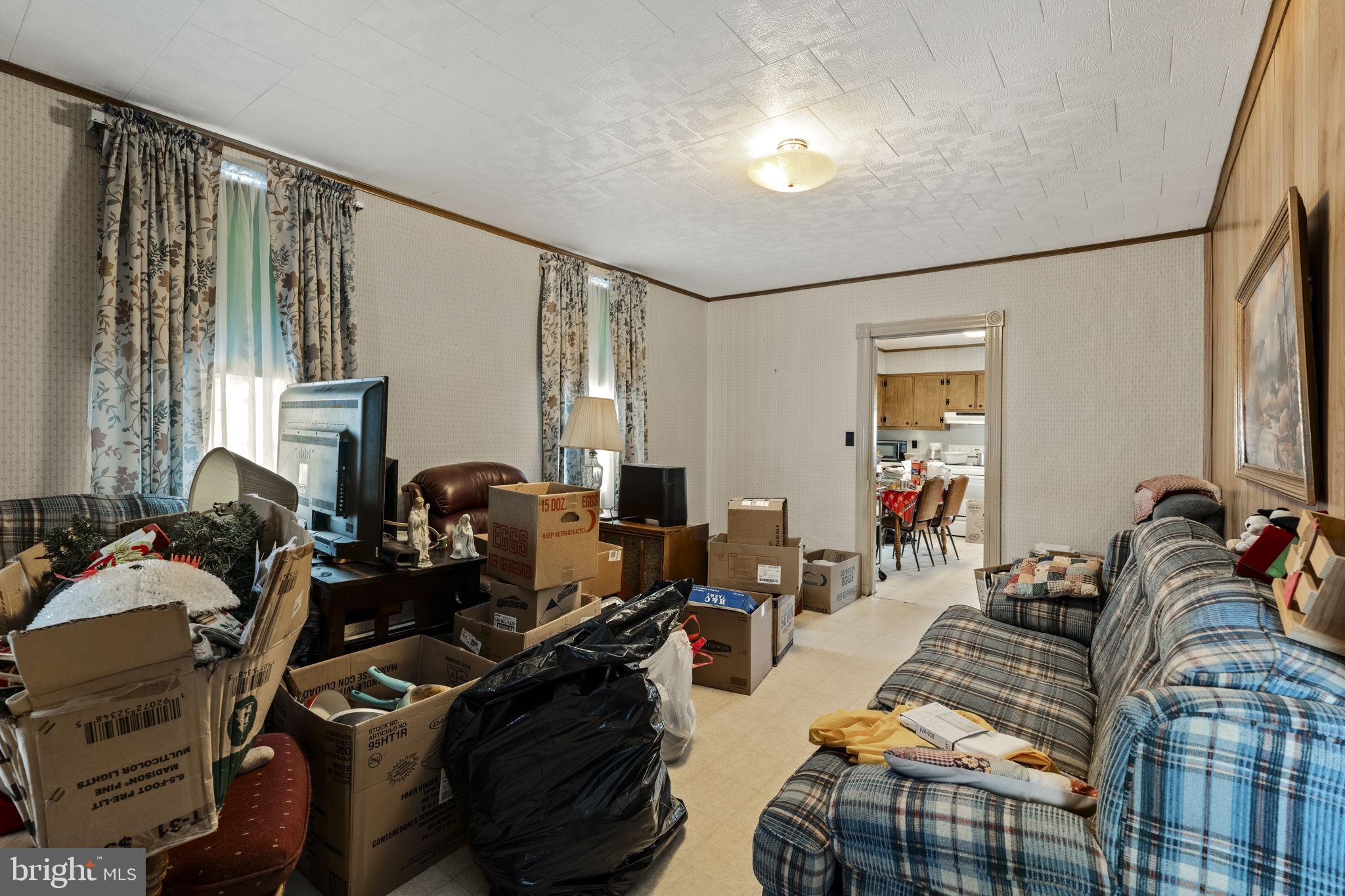22314 Miller Road Shade Gap, PA 17255 - Photo 38 of 73 a living room with furniture a couch and large windows