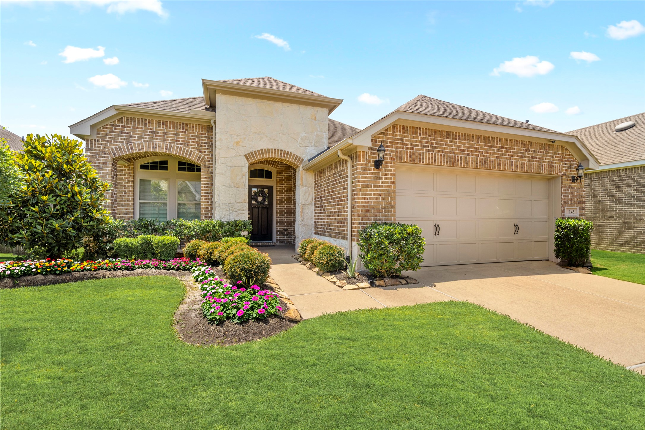 143 Castlegate Lane Houston, TX 77065 - Photo 32 of 33 This charming David Weekley home features classic architecture & attached 2-car garage. Upgraded w security cameras (Cisco Meraki) front yard, back yard, &in garage (2019)