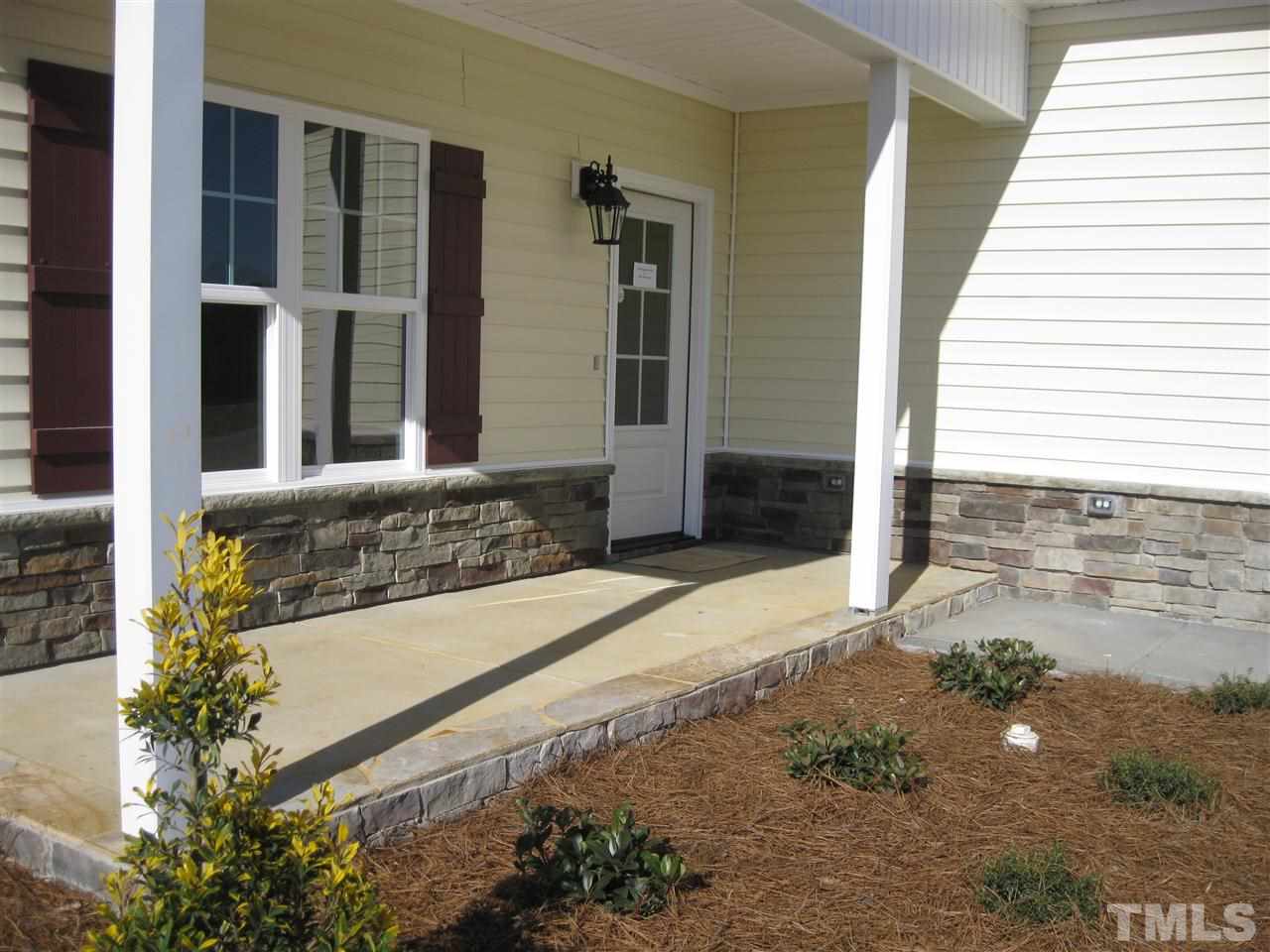 8044 Creech Road Middlesex, NC 27557 - Photo 2 of 14 The lovely covered front porch is the perfect place to chat with neighbors, watch the kids play, or just enjoy the day!