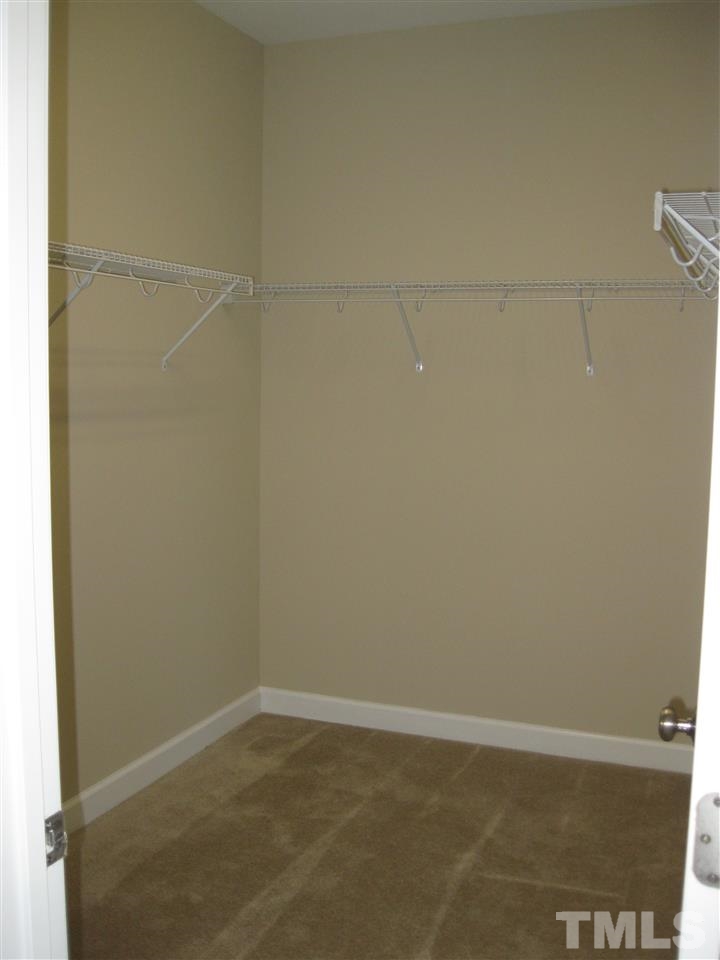 8044 Creech Road Middlesex, NC 27557 - Photo 11 of 14 The master closet has plenty of room to accommodate clothes for every season that North Carolina has to offer!!