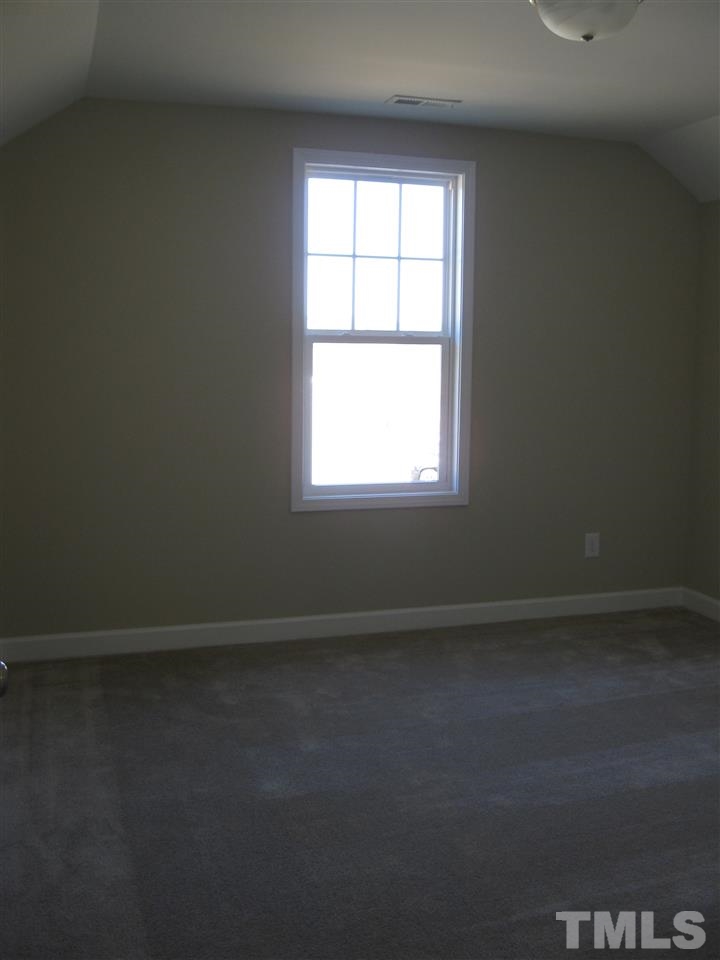 8044 Creech Road Middlesex, NC 27557 - Photo 12 of 14 Upstairs you will find 2 large secondary bedrooms. The perfect place for kids, guests, a home office or a man cave!