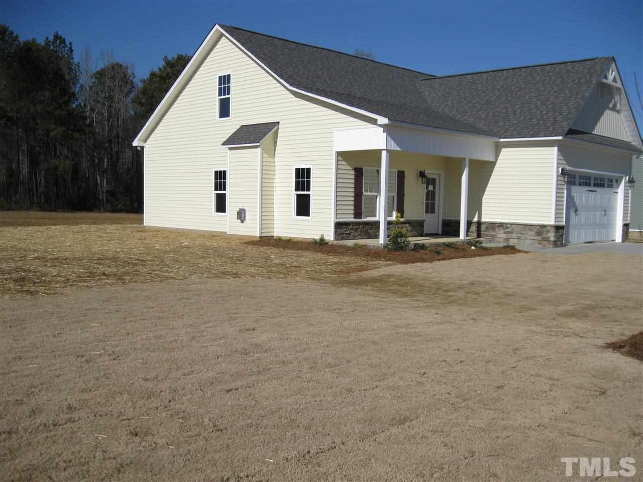 8044 Creech Road Middlesex, NC 27557 - Photo 14 of 14 Another view of this home shows the large flat yard.
