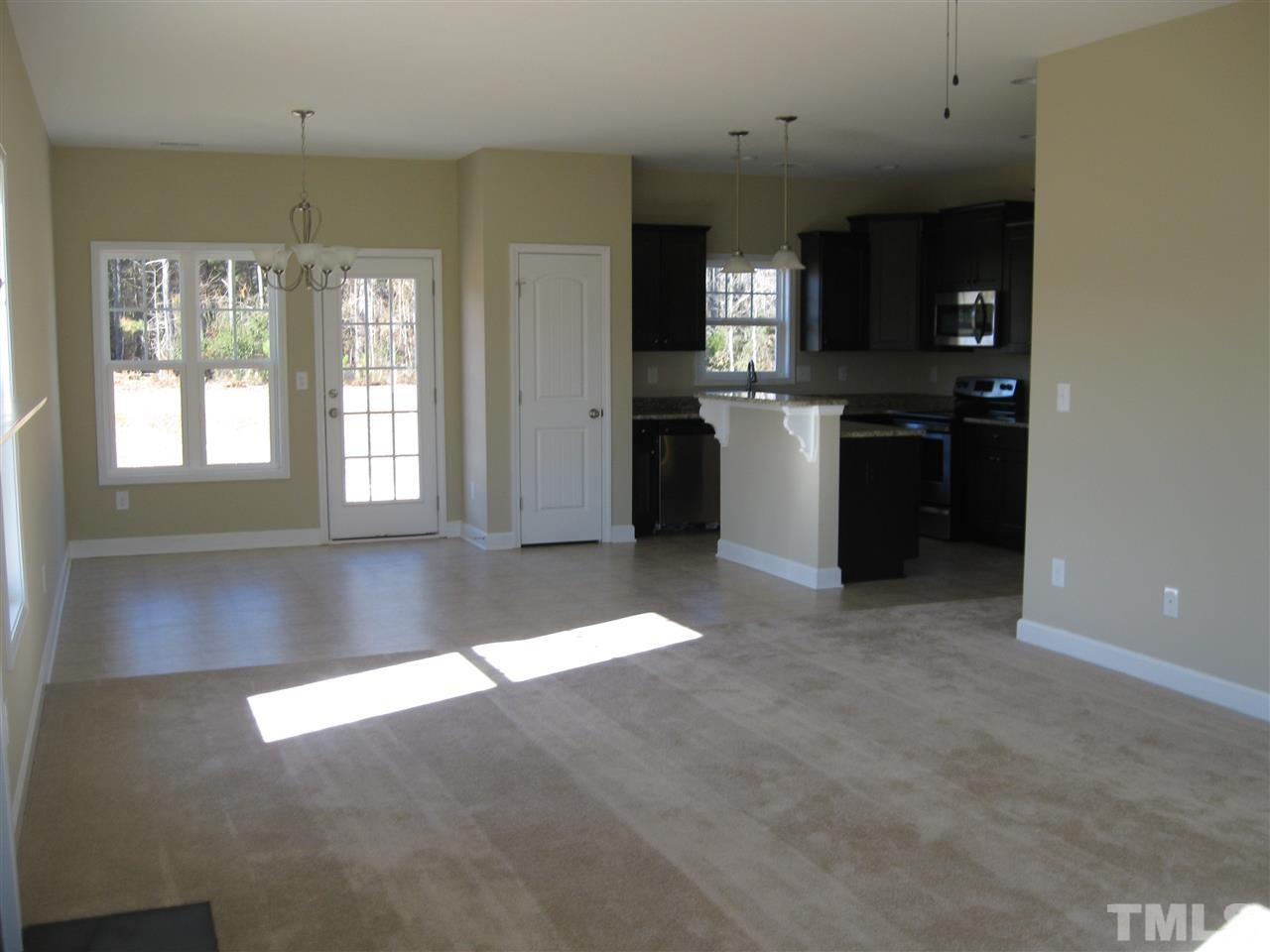 8044 Creech Road Middlesex, NC 27557 - Photo 4 of 14 The living room opens to the dining room and kitchen. It offers plenty of space for everyone!