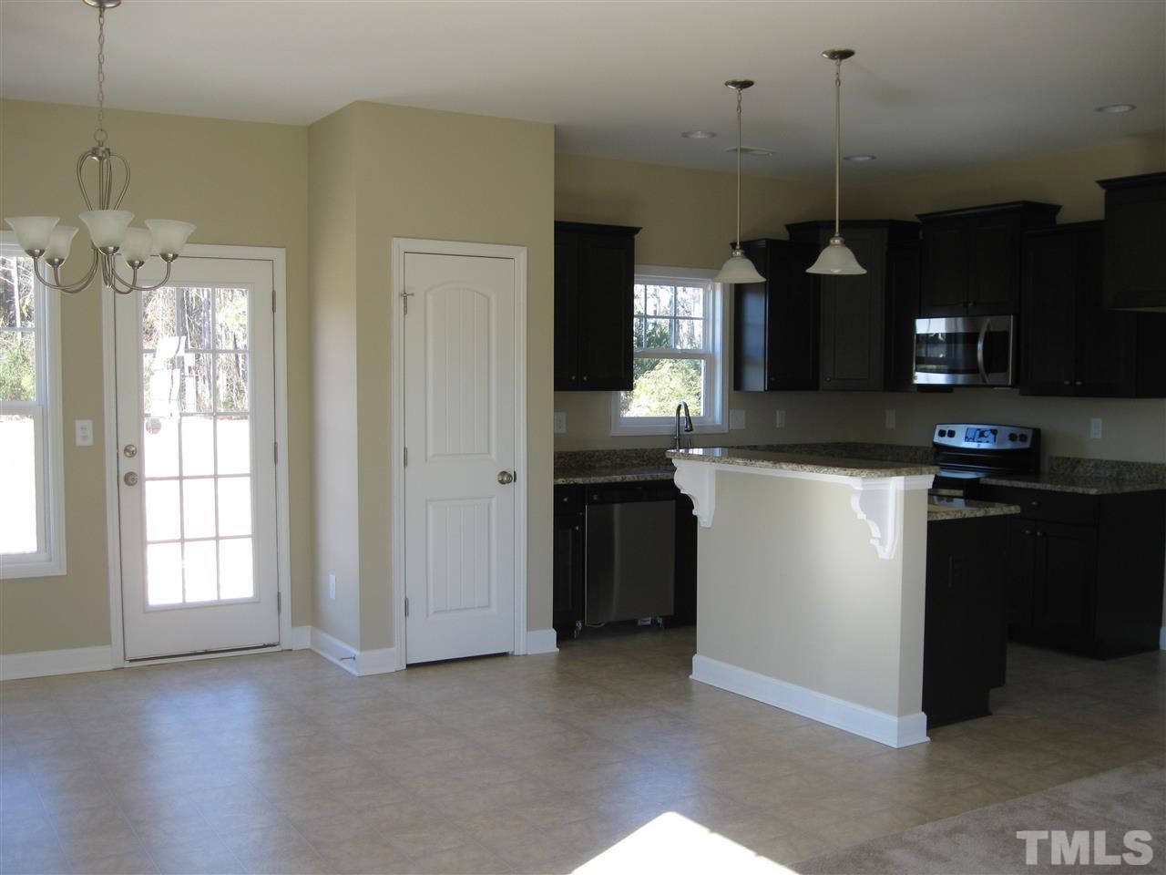 8044 Creech Road Middlesex, NC 27557 - Photo 5 of 14 Enjoy meals in the dining room or at the raised breakfast bar!