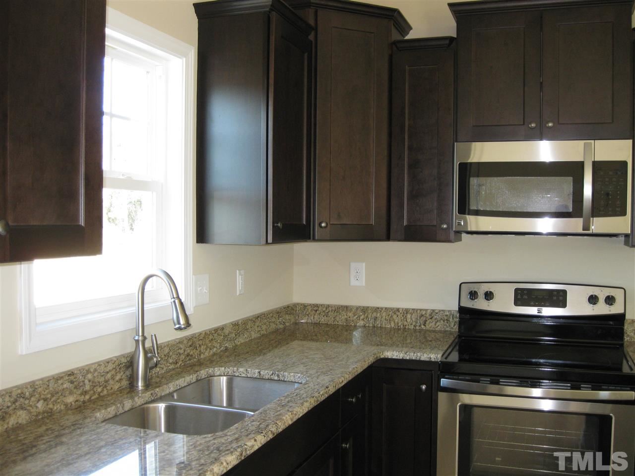 8044 Creech Road Middlesex, NC 27557 - Photo 7 of 14 The deep under mounted kitchen sink makes clean up a breeze!