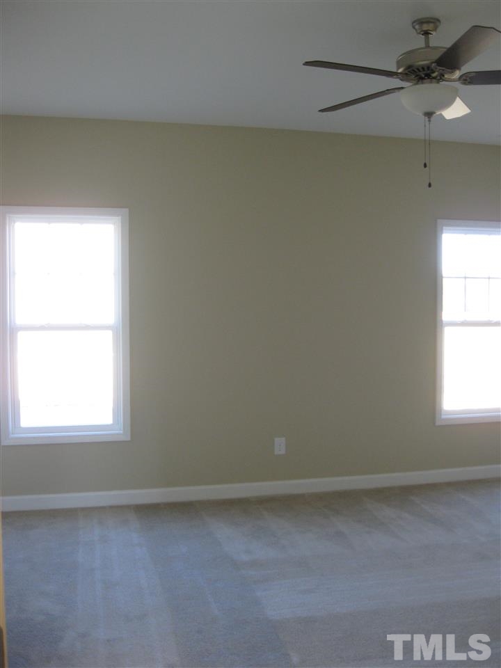 8044 Creech Road Middlesex, NC 27557 - Photo 9 of 14 The large Master Bedroom is on the first floor-conveniently located to everything you need! It has a ceiling fan, walk in closet and an attached bath.