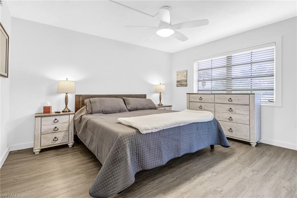 5 High Point Circle West, Unit 101 Naples, FL 34103 - Photo 12 of 40 Primary Bedroom