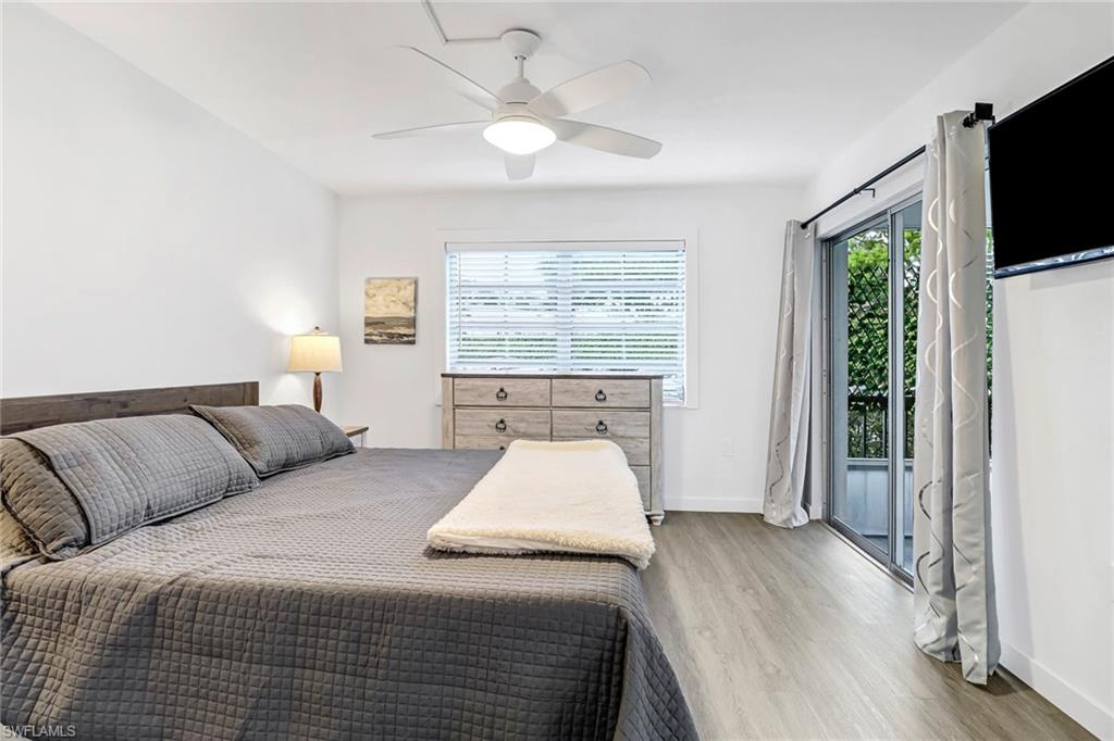 5 High Point Circle West, Unit 101 Naples, FL 34103 - Photo 13 of 40 Primary Bedroom