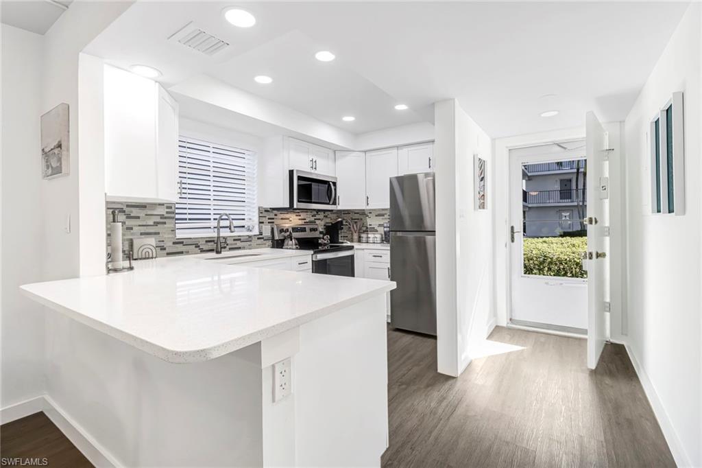 5 High Point Circle West, Unit 101 Naples, FL 34103 - Photo 5 of 40 Kitchen