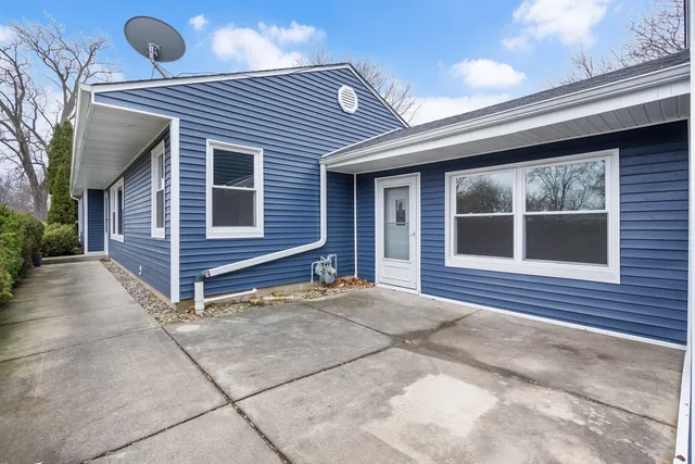 a view front of house with large windows