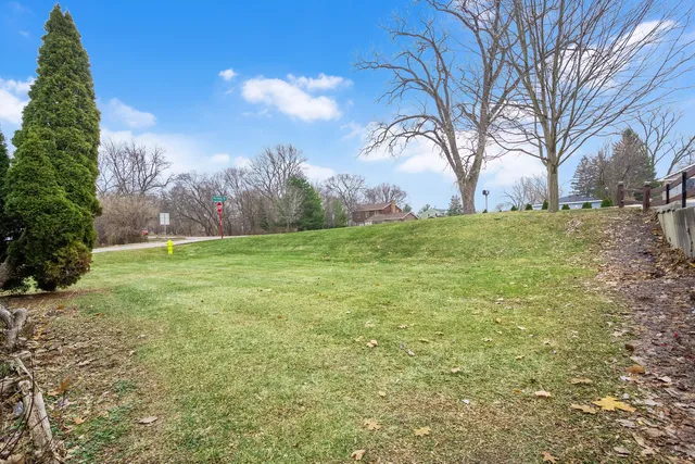 a backyard of a house with lots of green space