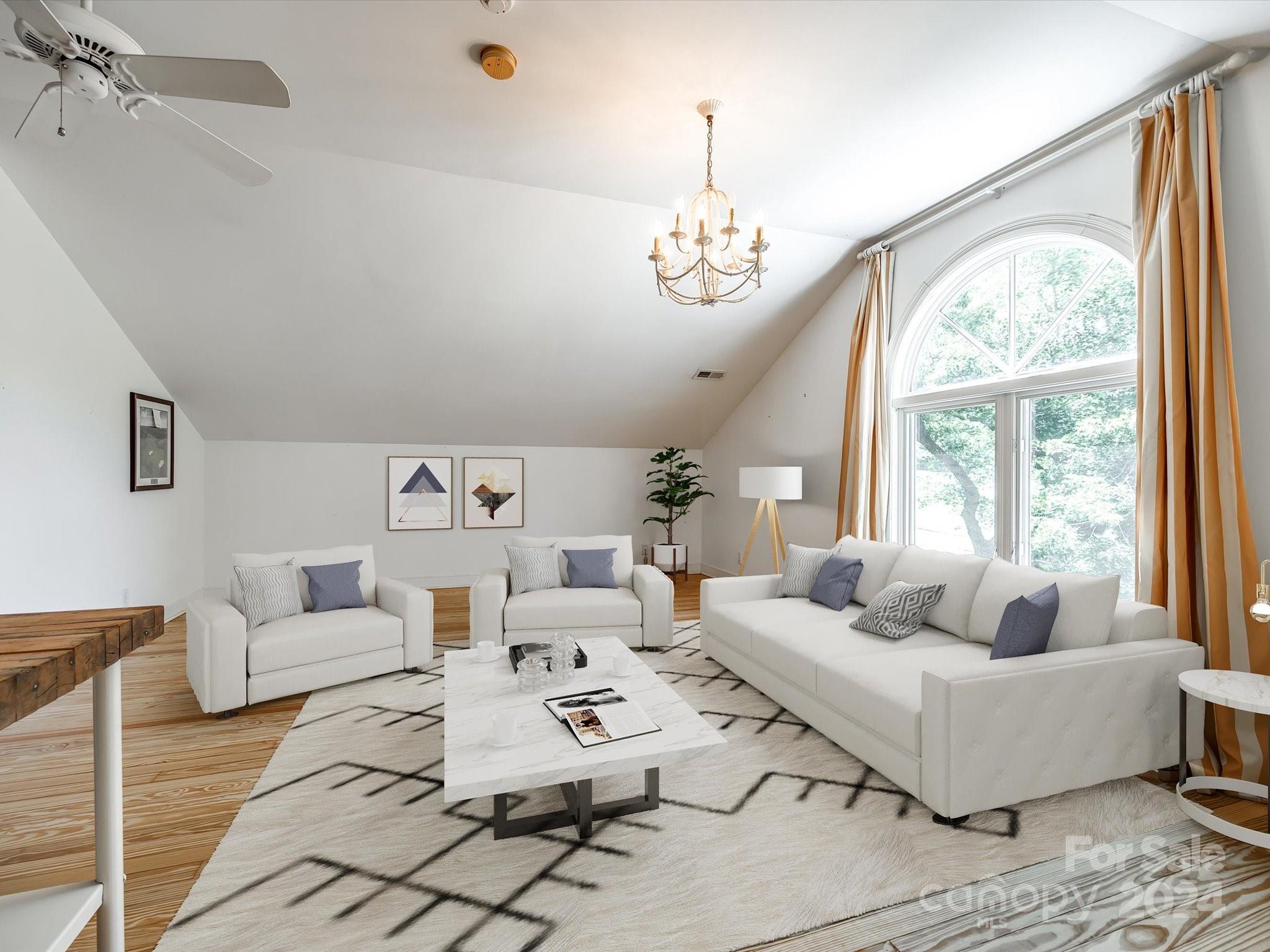 4001 Rounding Run Road Charlotte, NC 28277 - Photo 14 of 42 a living room with furniture chandelier and a large window