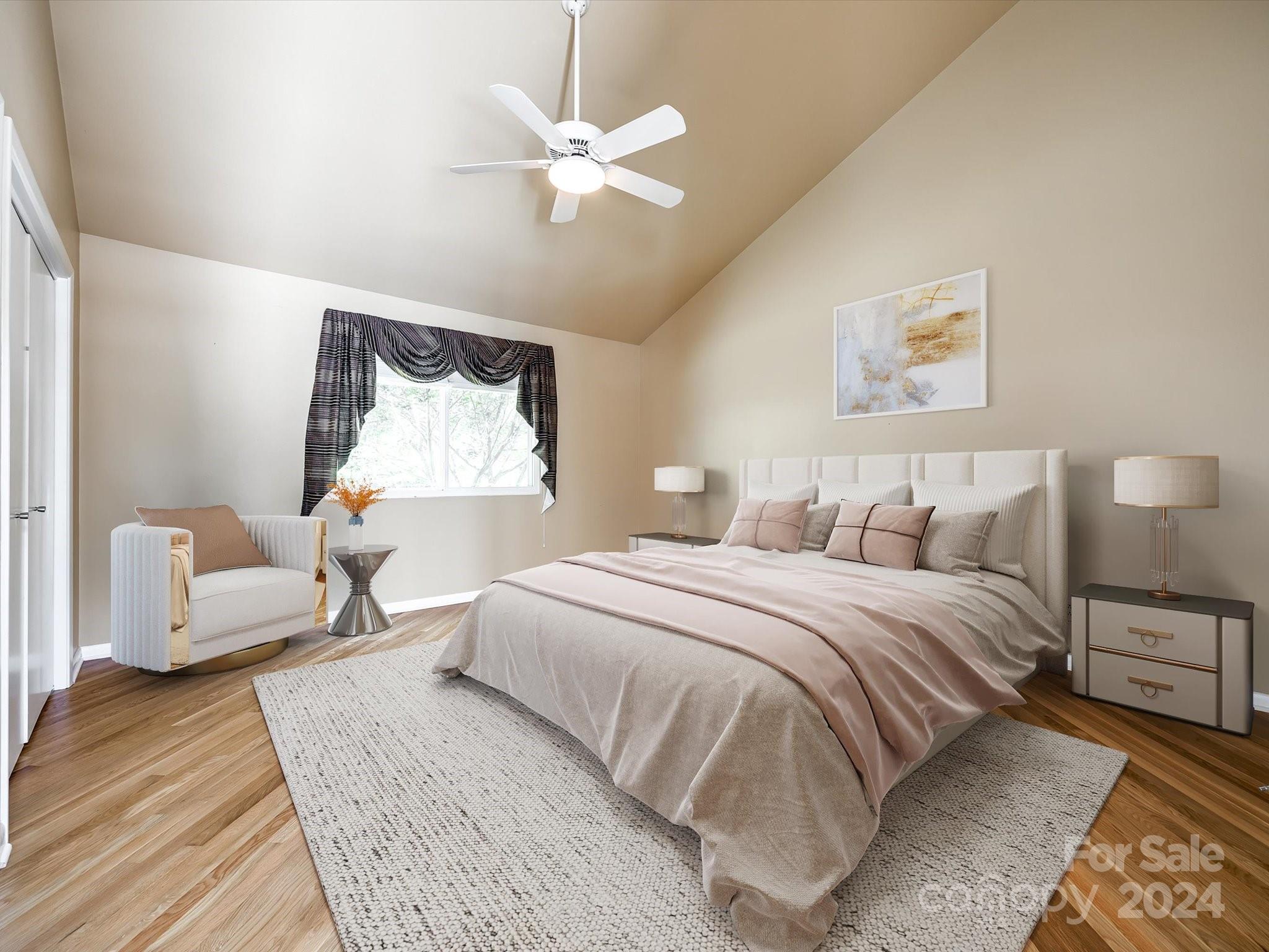 4001 Rounding Run Road Charlotte, NC 28277 - Photo 24 of 42 a spacious bedroom with a bed and wooden floor