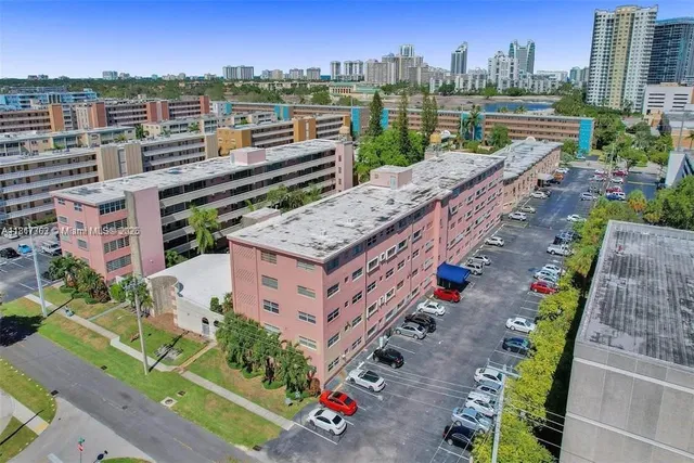 a view of a city with tall buildings