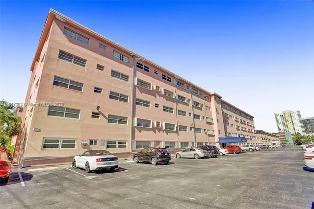 a car parked in front of a building