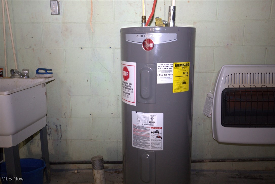 22760 Roy Croy Road Senecaville, OH 43780 - Photo 28 of 46 Utilities featuring water heater and heating unit