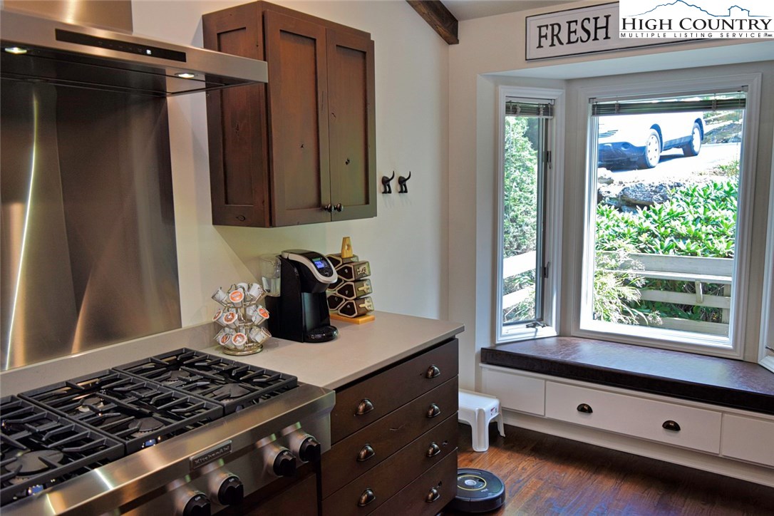 250 Ascot Lane Boone, NC 28607 - Photo 19 of 44 a kitchen with a stove and a window