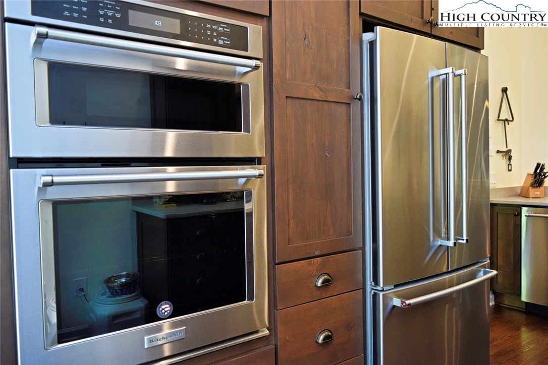 250 Ascot Lane Boone, NC 28607 - Photo 20 of 44 a stove top oven sitting inside of a kitchen