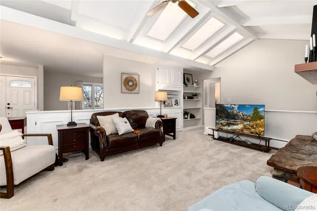 a living room with furniture and a couch