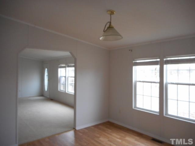 8124 Wiggins Mill Road Lucama, NC 27851 - Photo 4 of 12 a view of livingroom with window