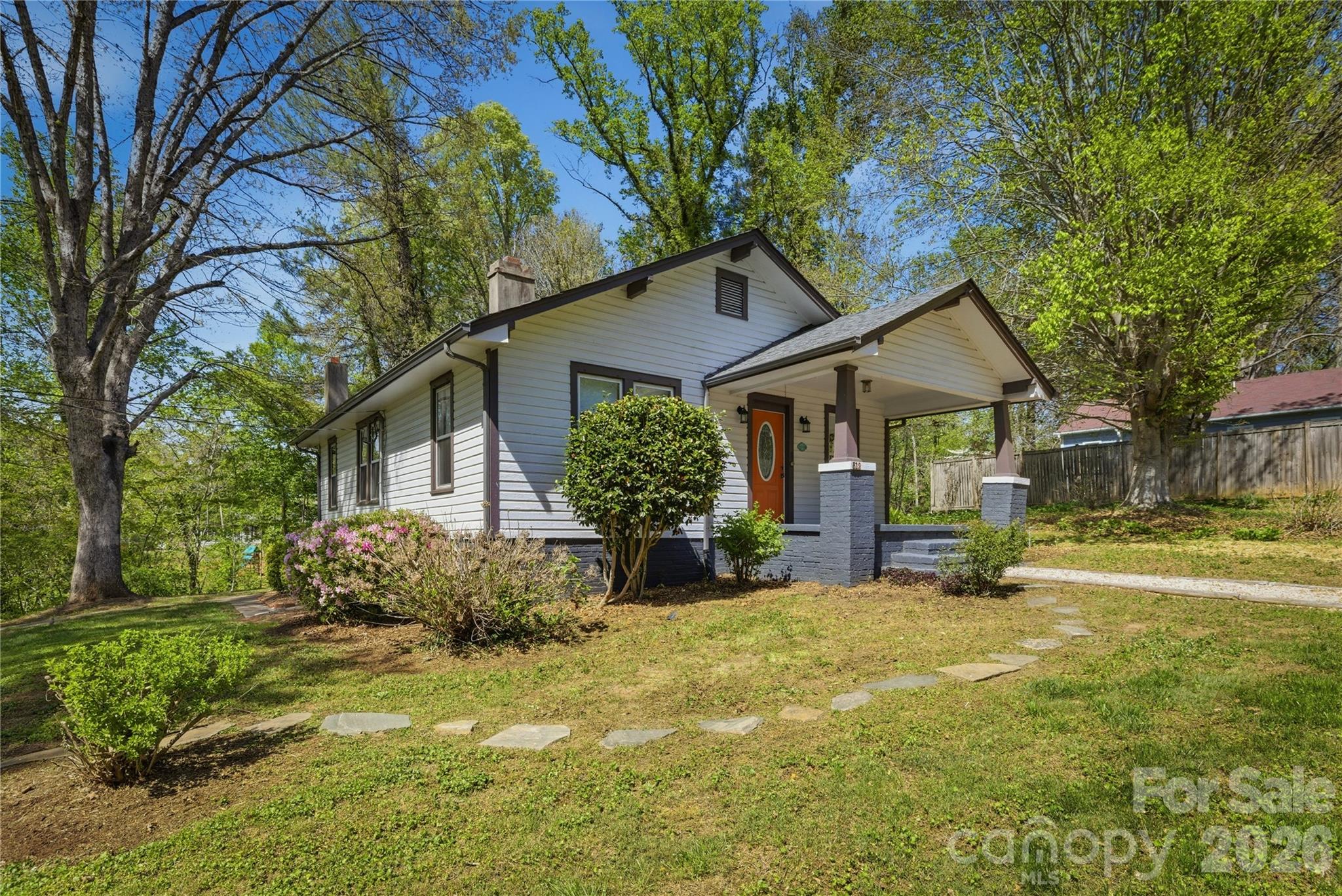512 Alexander Avenue Morganton, NC 28655 - Photo 2 of 29 a view of a house with backyard and sitting area