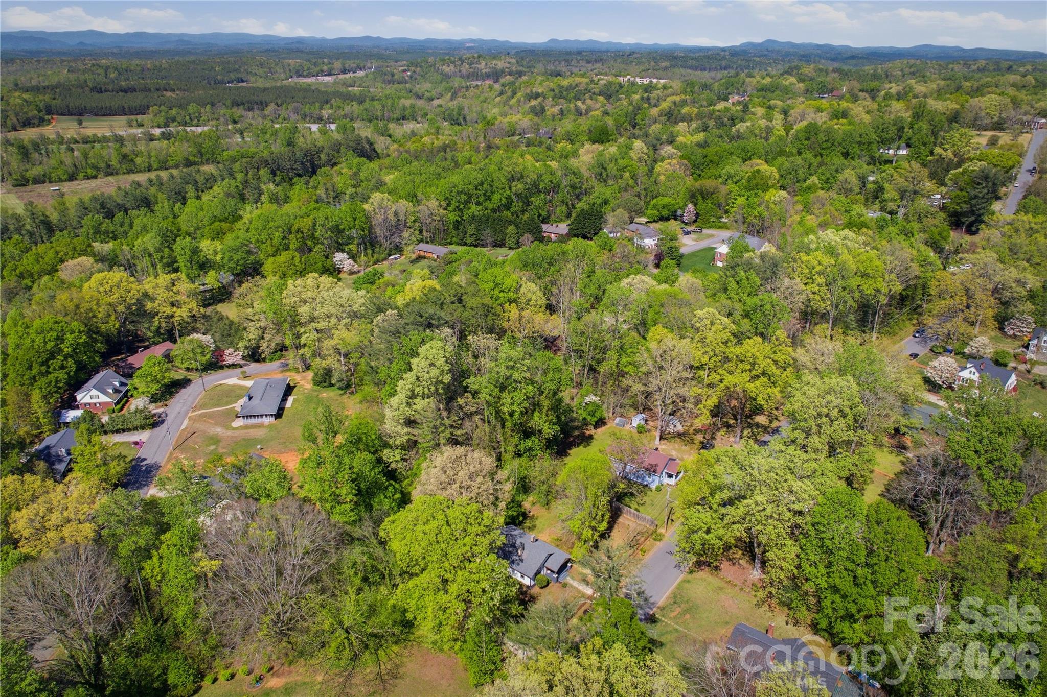 512 Alexander Avenue Morganton, NC 28655 - Photo 27 of 29 a view of a field with an trees