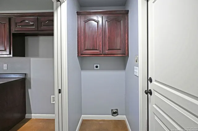 a view of room with washer and dryer