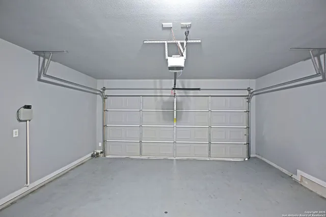 a view of a room with storage and racks on the wall
