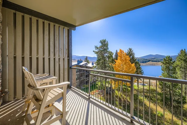 a view of a balcony with furniture