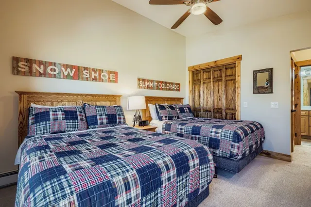 a bedroom with bed and window