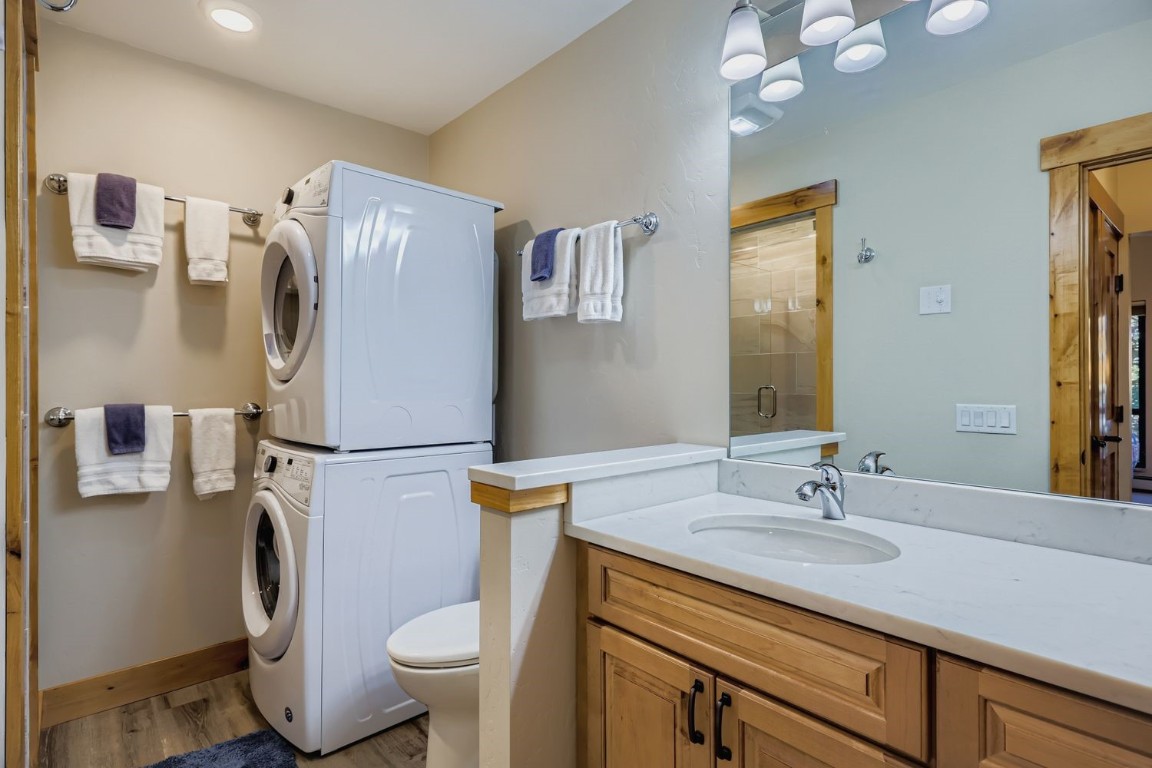 160 La Bonte Street, Unit 306 Dillon, CO 80435 - Photo 9 of 47 a bathroom with a sink a toilet and mirror