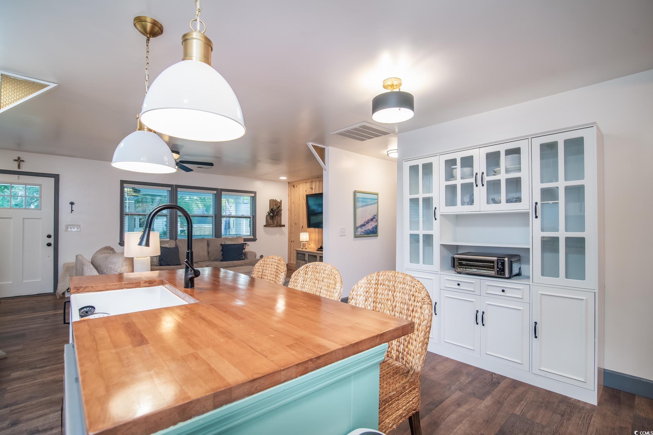 1714 Oak Street Georgetown, SC 29440 - Photo 13 of 40 Dining area featuring dark hardwood / wood-style f
