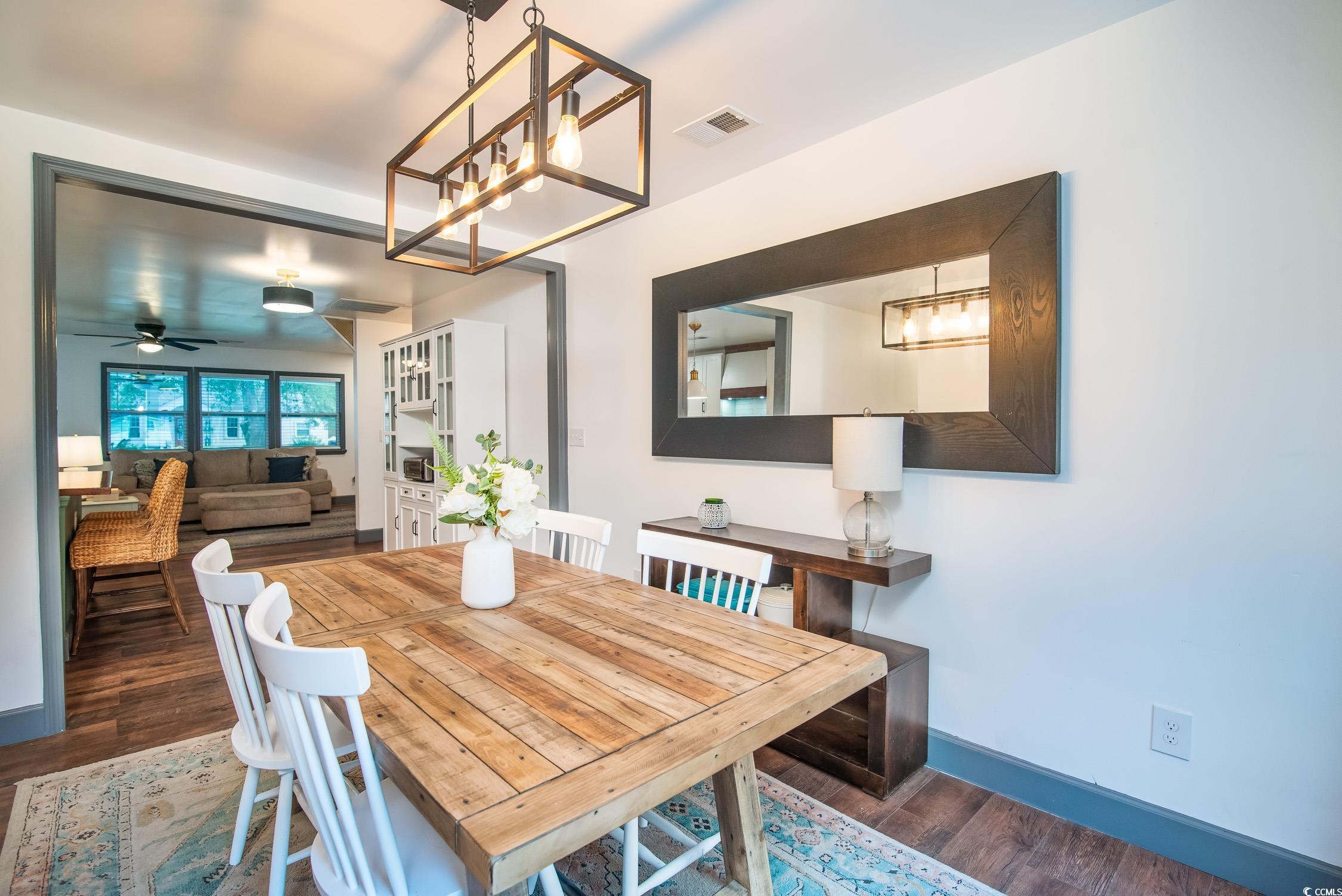 1714 Oak Street Georgetown, SC 29440 - Photo 16 of 40 Dining room featuring ceiling fan with notable cha
